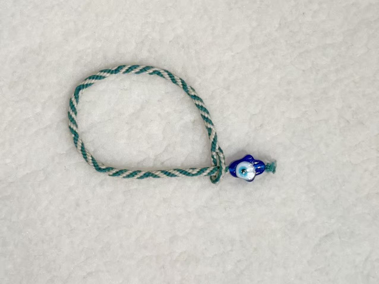 Evil Eye E03 — Teal & cream · Blue charm