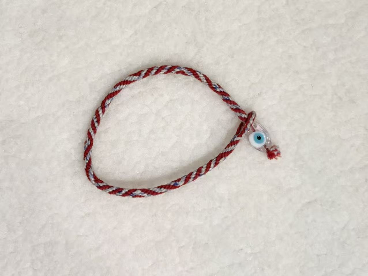Evil Eye E04 — Burgundy & cream · Pale charm